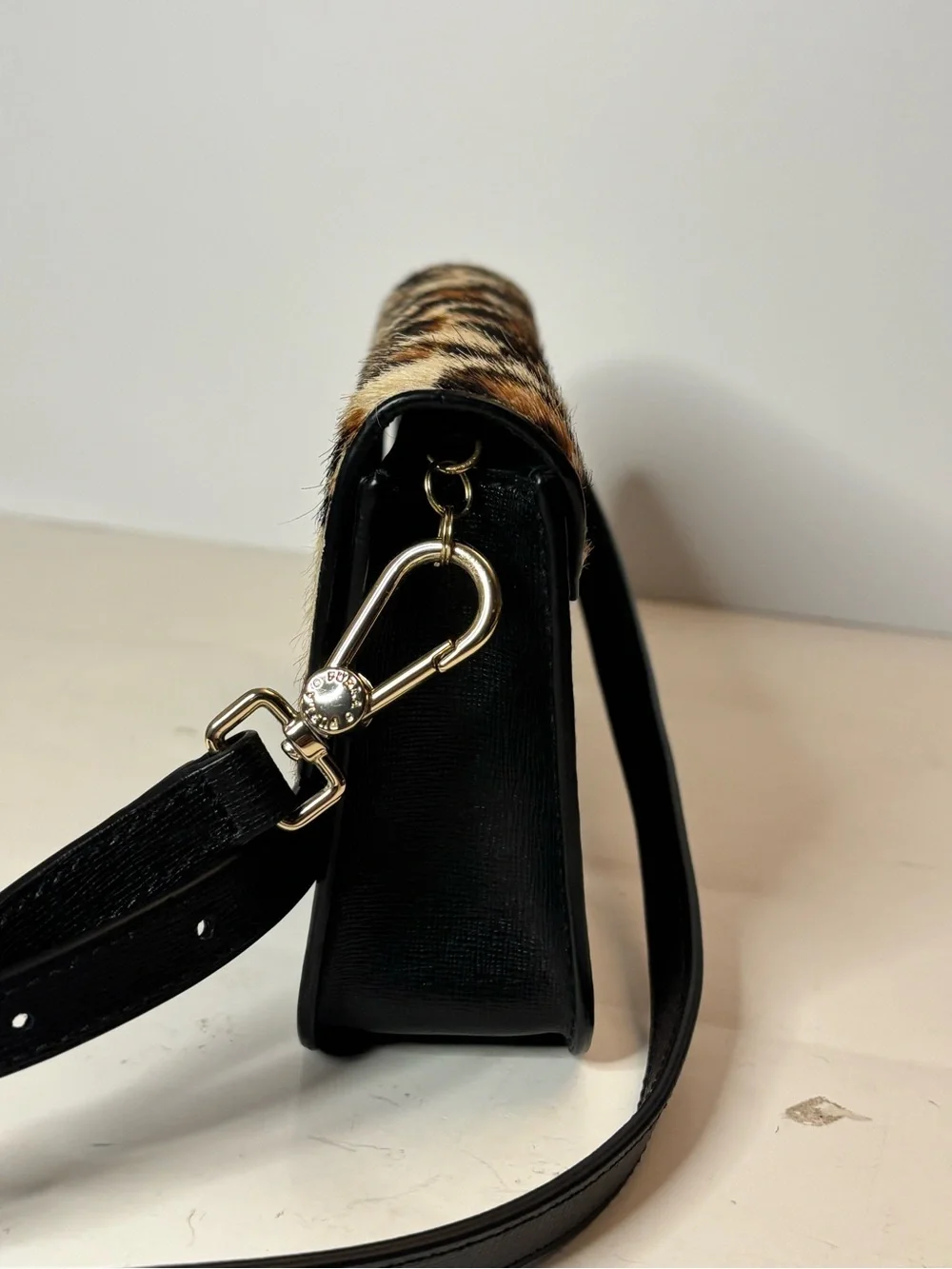 Furla Bella mini crossbody with leopard print calf hair and leather. Adjustable